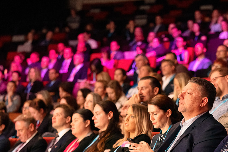 A large crowd of attendees at the Digital Summit.