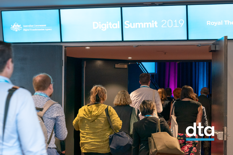 People walking into the Digital Summit.