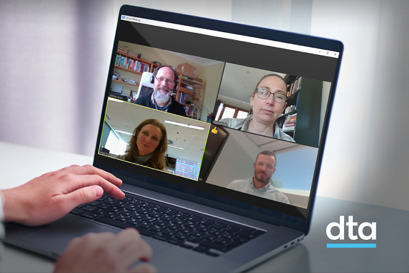 Team in an online meeting on a laptop